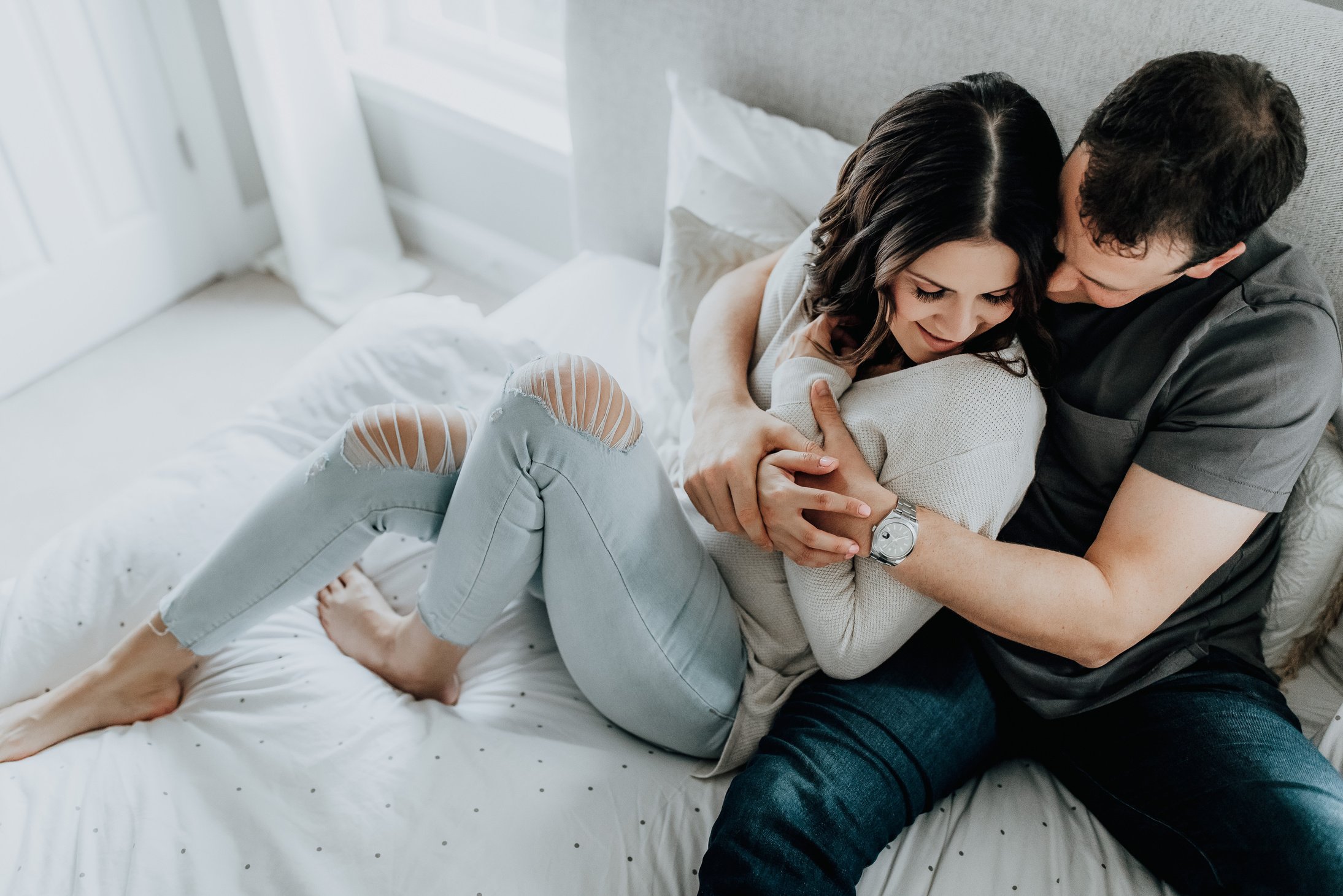 Couple Embracing at Bed